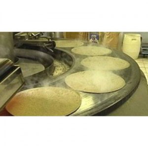 Machine industrielle pour la production de crêpes et de bricks